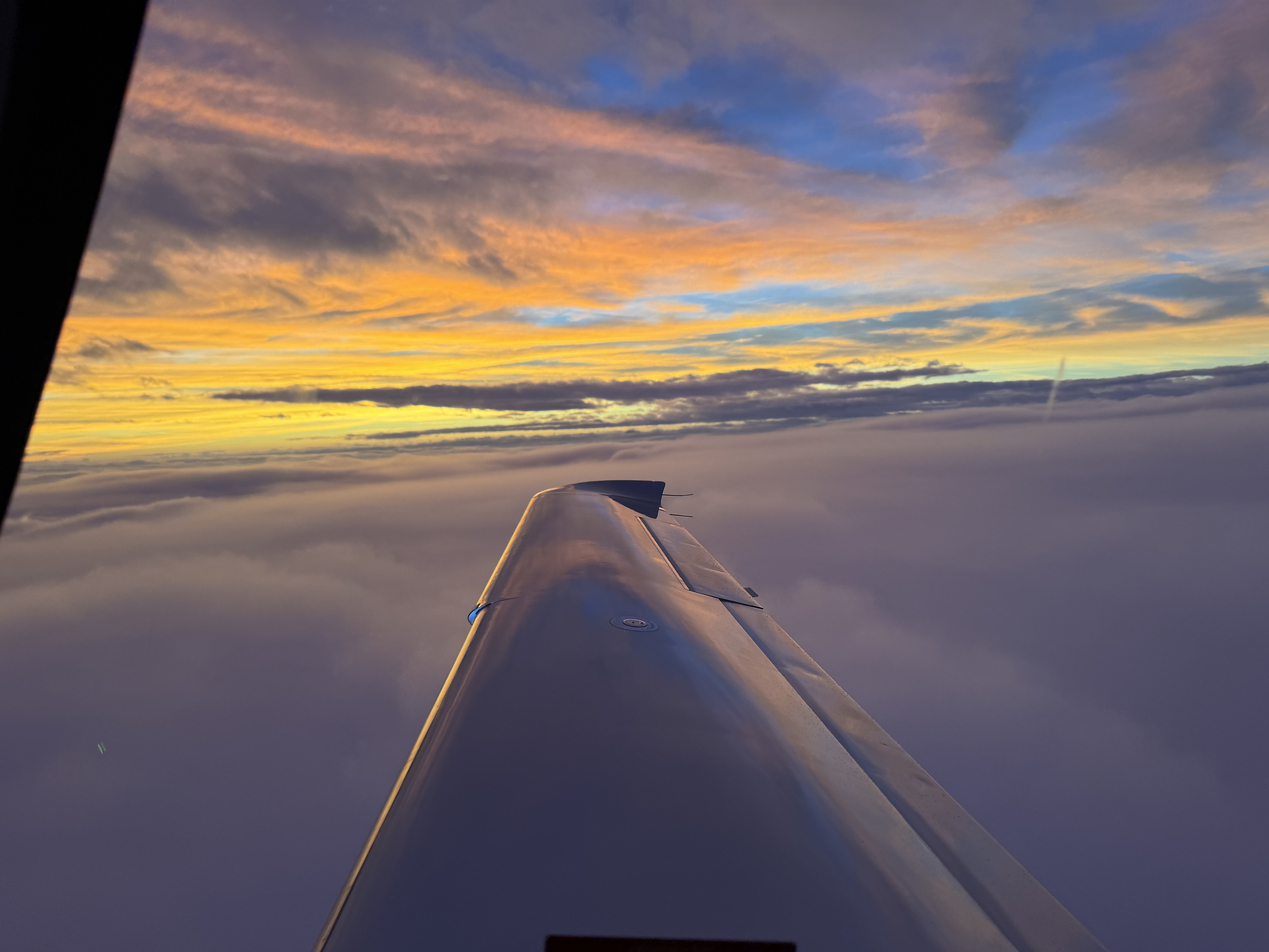 Flying above the clouds on an IFR flight at Coast Aero Ventures